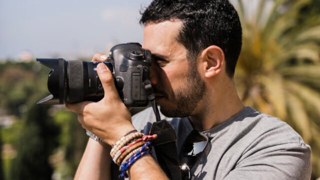 side-view-man-capturing-pica-camera