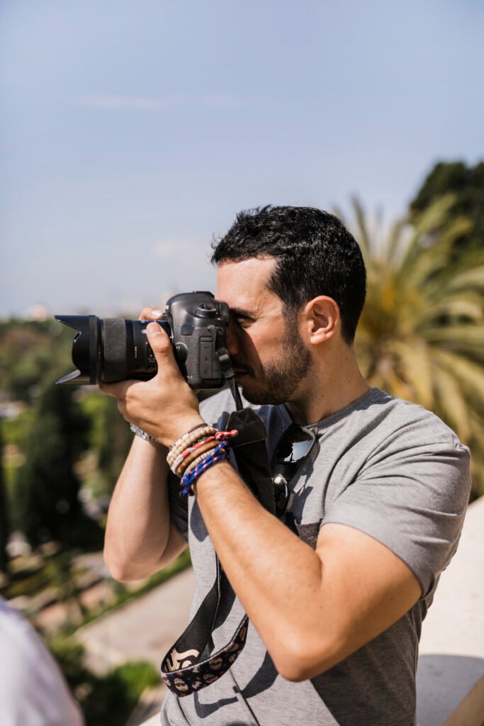 side-view-man-capturing-pica-camera